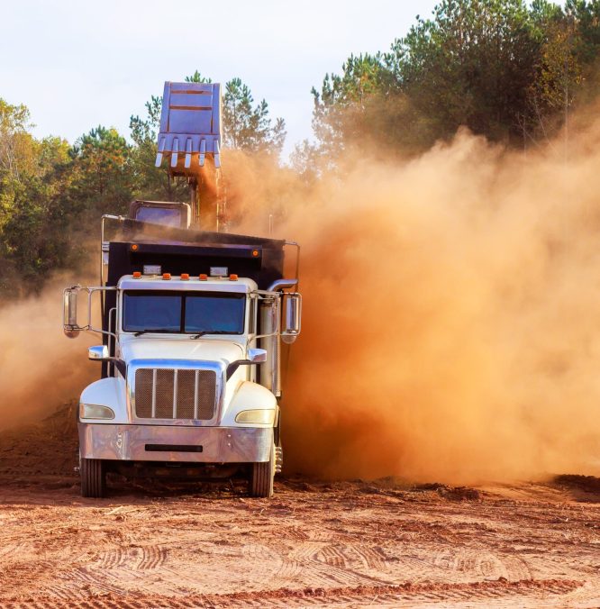 construction-truck-at-work-creating-dust-in-constr-2025-03-27-05-04-46-utc-min